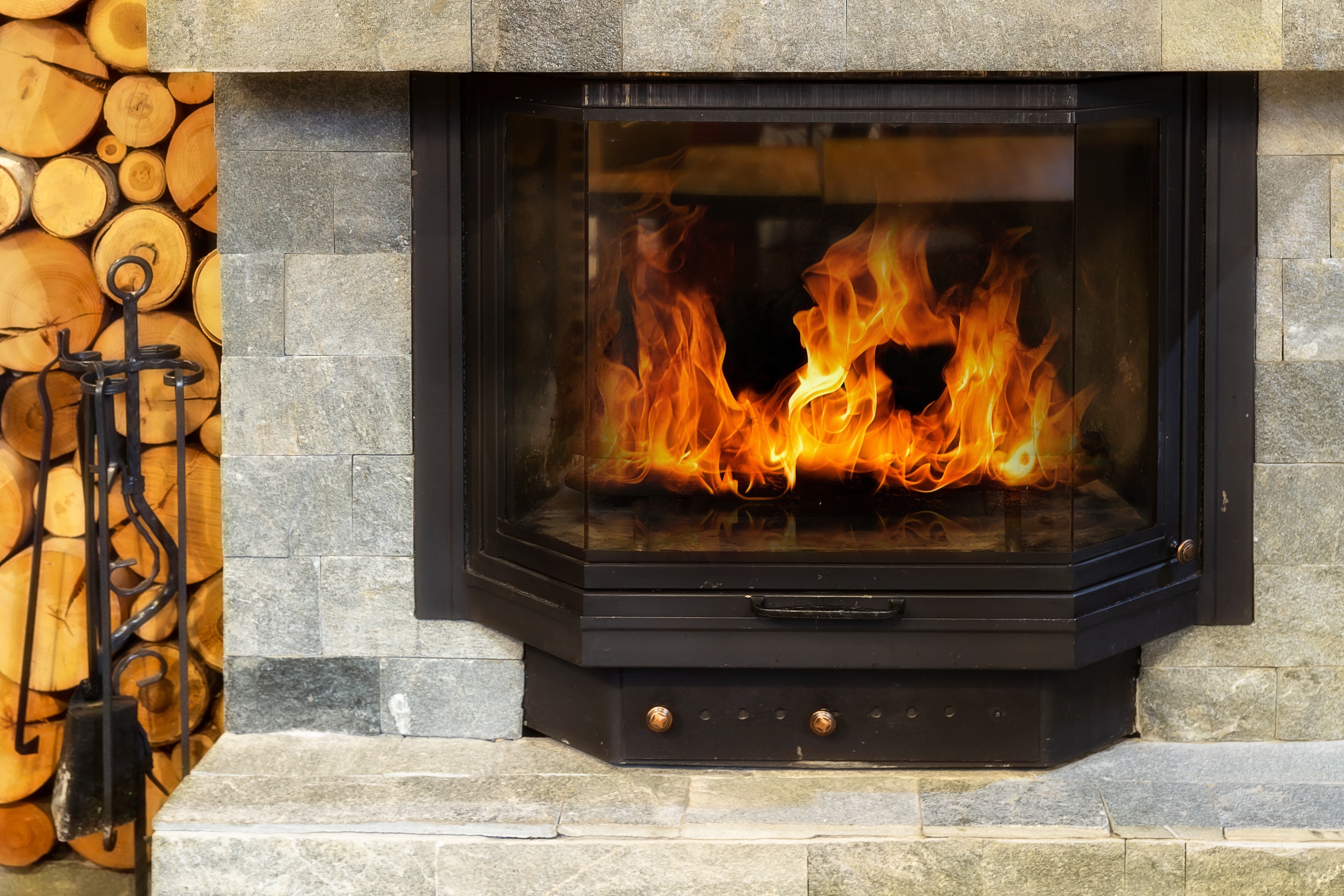 Stone,Fireplace,With,Burning,Fire,,Cozy,Winter