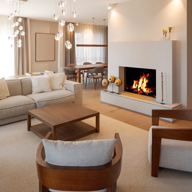 Prestigious,Living,Room,,Inside,Sofa,Armchairs,And,A,Beautiful,Burning