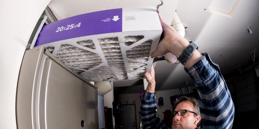 Thick,Furnace,Filter,Demonstration,By,A,Handyman Furnace Maintenance Checklist for This Spring