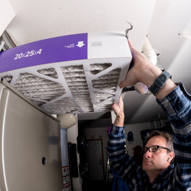 Thick,Furnace,Filter,Demonstration,By,A,Handyman Furnace Maintenance Checklist for This Spring
