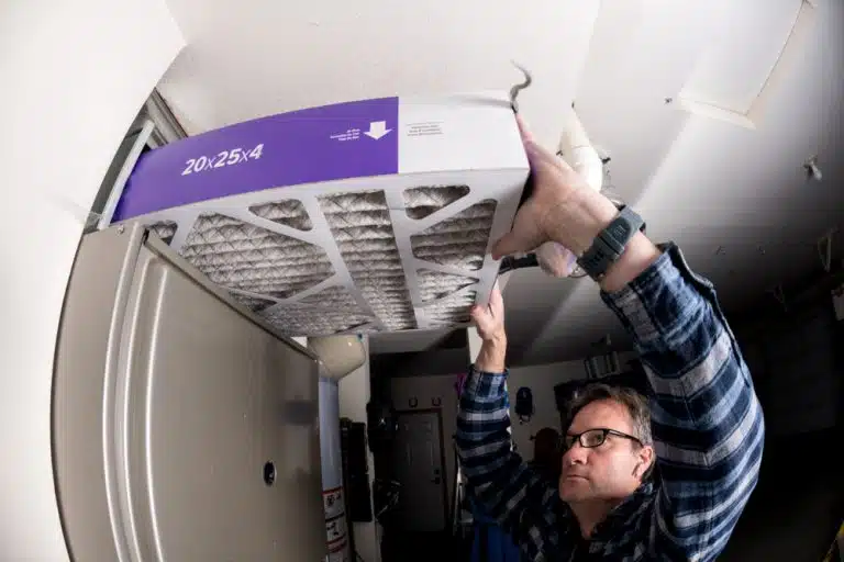Thick,Furnace,Filter,Demonstration,By,A,Handyman Furnace Maintenance Checklist for This Spring